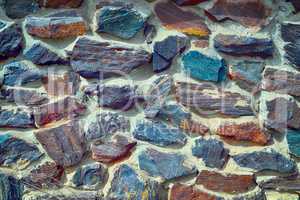 The texture in the form of a wall of colored quartz