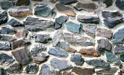 The texture in the form of a wall of colored quartz