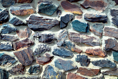 The texture in the form of a wall of colored quartz