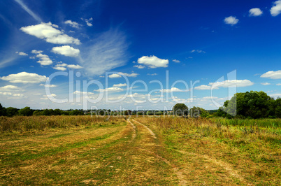 Landscape with dirt road in the countryside