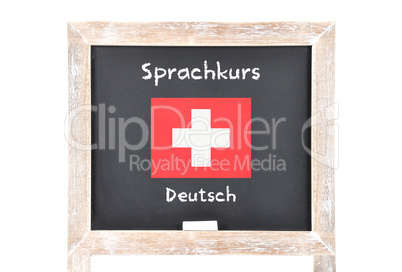 Sprachkurs mit Flagge auf Tafel