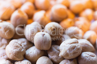 Chickpeas Close Up. Pile of Organic Uncooked Chickpeas. Gold Chi