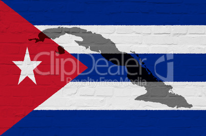 Kuba Flagge auf einer Steinmauer