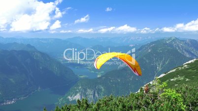 Paraglider over Mountains and Lkes