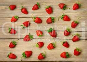 strawberries on a wooden surface background