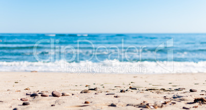 Closeup of little rocks on the beach