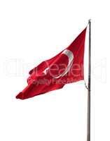 Turkish flag on flagpole waving in windy day