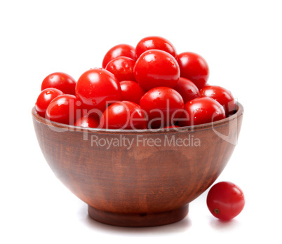 Wet cherry tomato in ceramic bowl