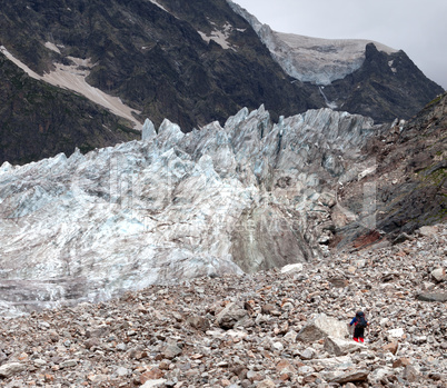 Glacier and hiker on moraine
