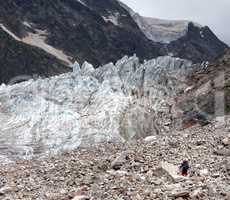 Glacier and hiker on moraine