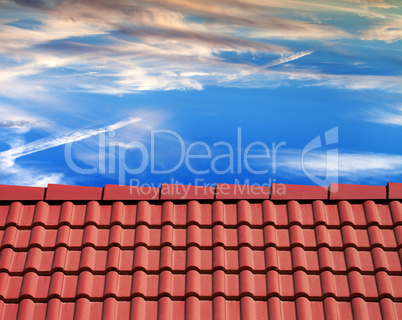 Roof tiles and sunset sky