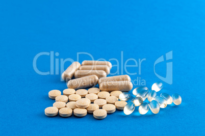 Closeup of various pills of supplement