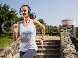 The girl running in the park.