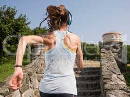 The girl running in the park.