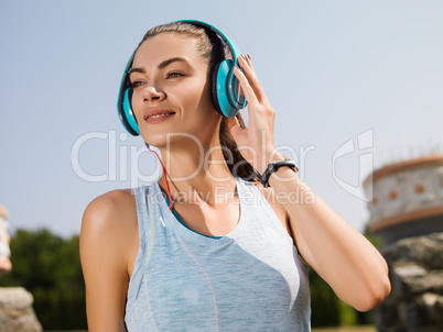 The girl running in the park.