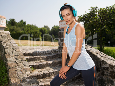 The girl running in the park.