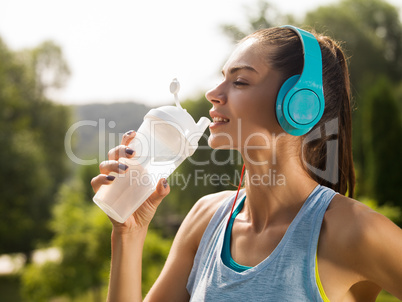 The girl running in the park.