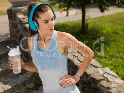 The girl running in the park.