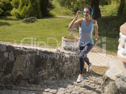 The girl running in the park.