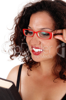 Closeup of woman with red glasses.