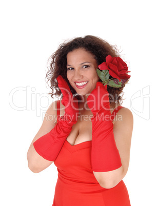 Woman in red dress and cloves.