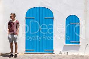 Teenage boy standing relaxed