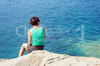 Young woman looking at sea