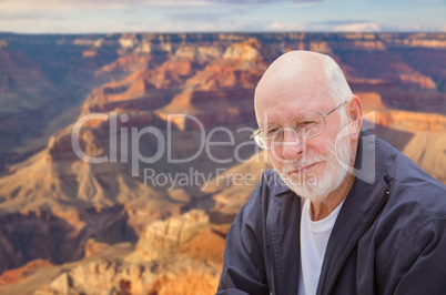 Happy Senior Man Posing on Edge of The Grand Canyon