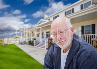 Senior Adult Man in Front of House