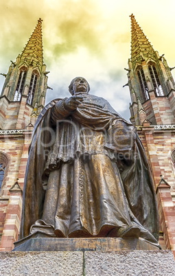 Charles-Emile Freppel statue in front of Saints-Pierre-et-Paul-Church in Obernai, France