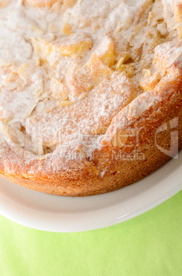 Sweet cake on a green background