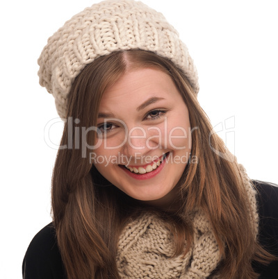 Young happy woman with wool cap and scarf