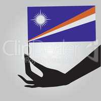 Hand with flag Marshall Islands