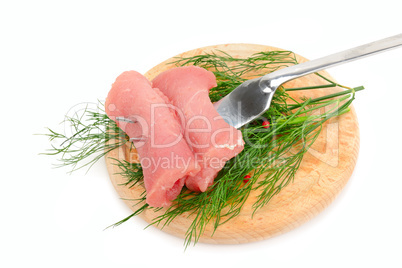 beef fillet on a fork isolated on a white background
