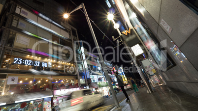 Night street with illuminated banners on buildings. Seoul, South Korea