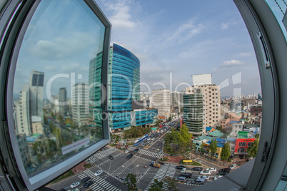 Traffic on city streets. Window view to Seoul, South Korea