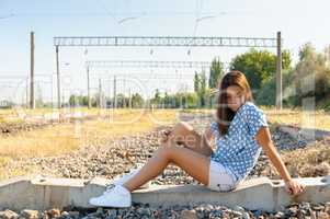 Teenager girl in city outskirts