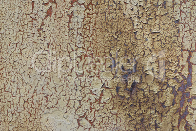 Cracked paint on the rusty iron