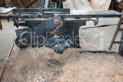 Old planing machine in the joinery workshop