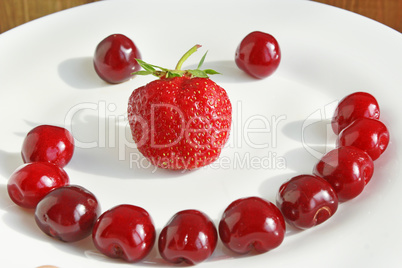 strawberry cherry with cake in shape of smile