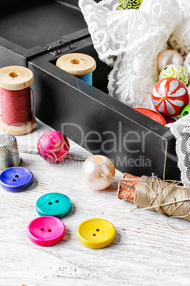 Thread,button and fabric