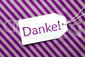 Label On Purple Wrapping Paper, Danke Means Thank You