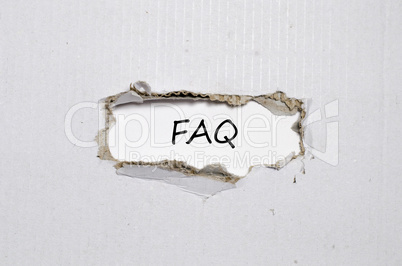 The word faq appearing behind torn paper