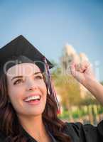 Happy Graduating Mixed Race Woman In Cap and Gown