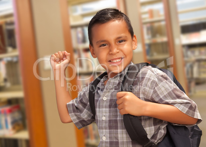 Hispanic Student Boy with Backpack in the Library