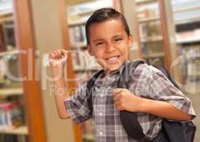 Hispanic Student Boy with Backpack in the Library