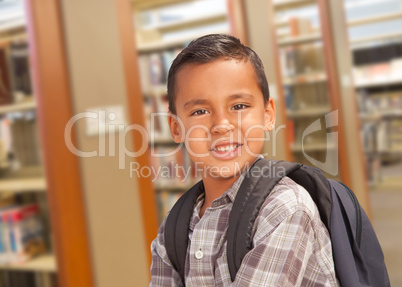 Hispanic Student Boy with Backpack in the Library