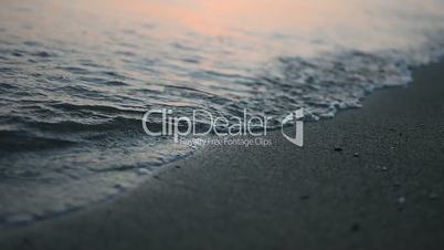 Nirvana on the Beach - Peaceful Idyllic Scene of a Golden Sunset Over the Sea, Waves Slowly Splashing on the Sand