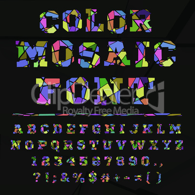 Broken colored alphabet on a dark background