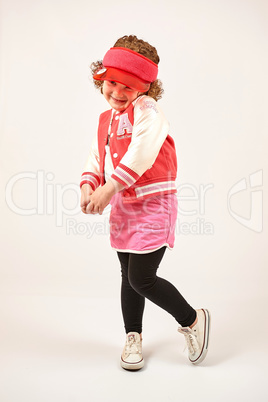 Little Girl Fashion Model With Red Cap